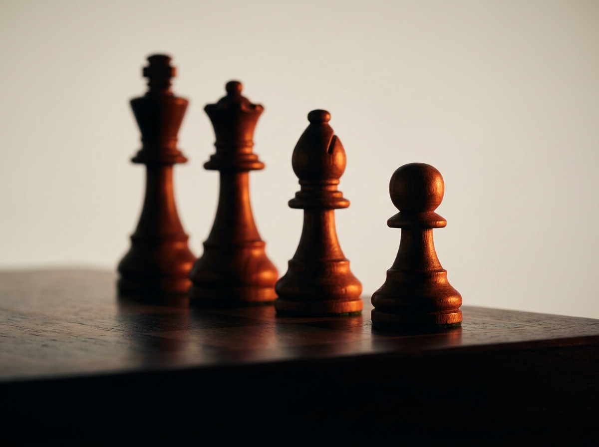 Four chess pieces in a row representing strategic business moves, illustrating Netflix's four moves toward a cable-style business model
